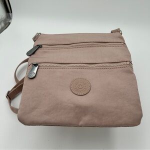 KIPLING Keiko Pink Travel Crossbody Bag with Multiple Zippered Compartments